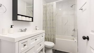 Hair dryer, towels, soap, shampoo