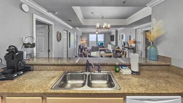 Condo, 4 Bedrooms | Private kitchen | Fridge, coffee/tea maker