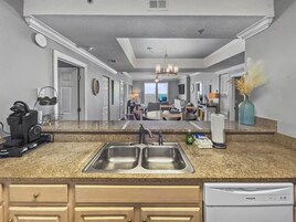 Condo, 4 Bedrooms | Private kitchen | Fridge, coffee/tea maker