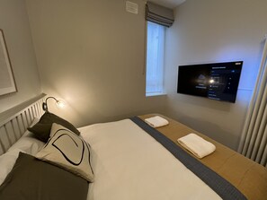 Iron/ironing board, free WiFi, bed sheets