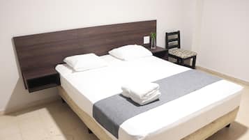 Economy Room | 1 bedroom, down comforters, free WiFi
