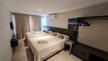 Apartamento executivo | Wi-Fi de cortesia, roupa de cama