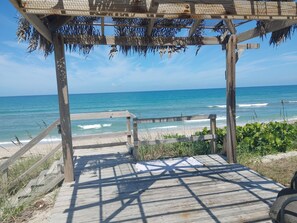On the beach, sun loungers, beach towels
