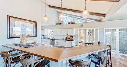 Spacious riverfront home with pool, patio, deck, & grill - great views