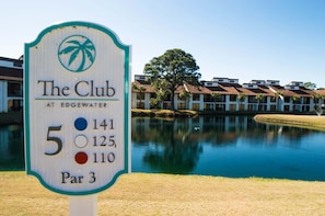 A golf course sign with 'The Club at Edgewater' and hole numbers 5, 141, 125, and 110. - Paradise Palms Edgewater T3-Beachfront-1 BD/1BTH-Sleeps 4-Mesmerizing Views! (Panama City Beach)