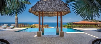 Exquisite ocean-view villa with pool, balcony, & central AC