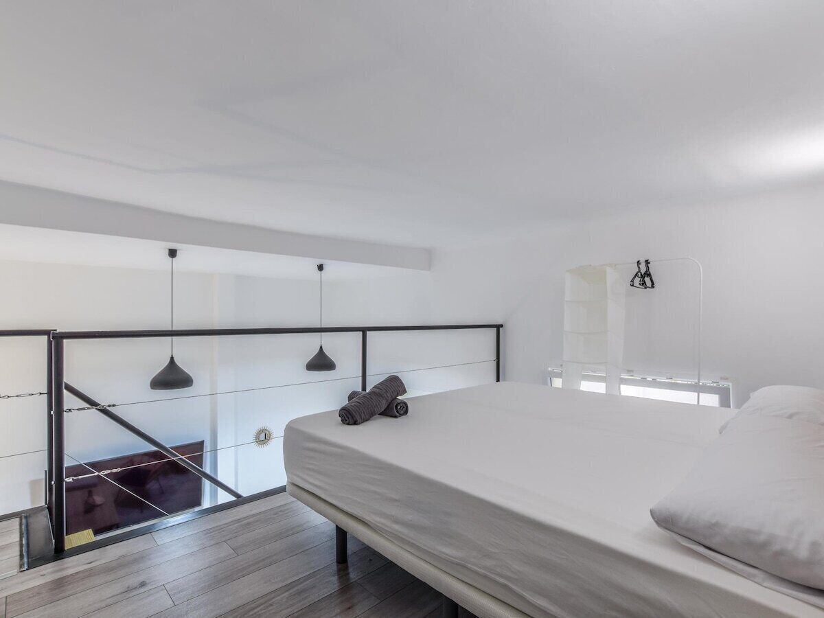 Tabla de planchar con plancha, wifi gratis, ropa de cama