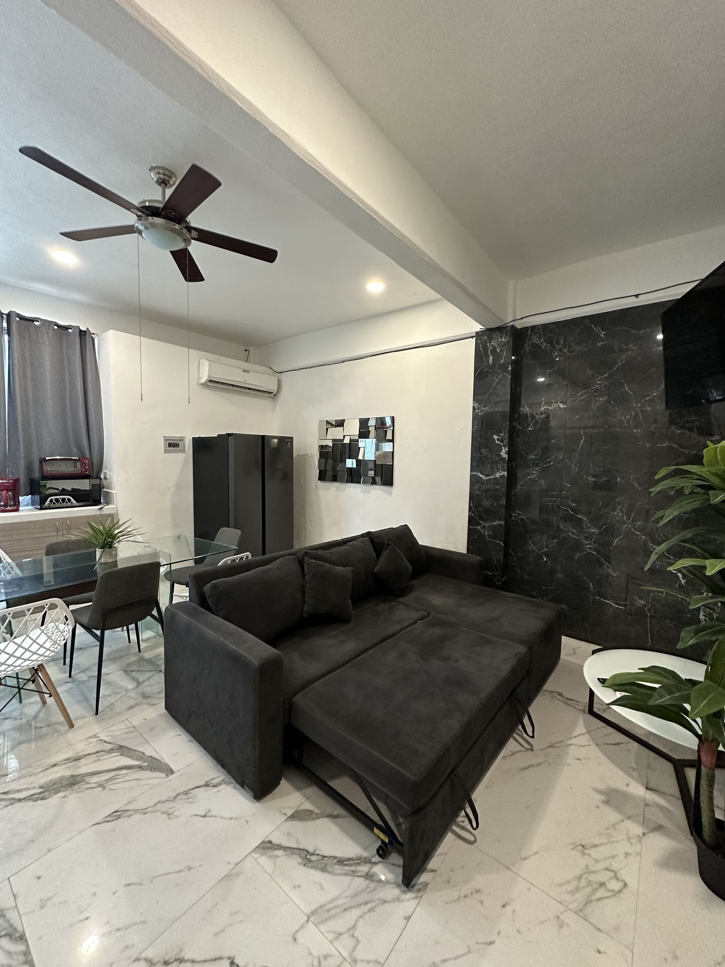 Family Apartment, 2 Bedrooms | Living area | 35-inch Smart TV with digital channels, TV, Netflix
