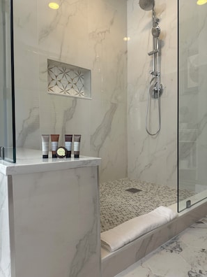 Shower, hair dryer, towels, soap