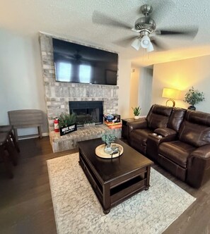 Smart TV, fireplace, DVD player, books