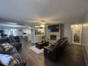 Smart TV, fireplace, DVD player, books