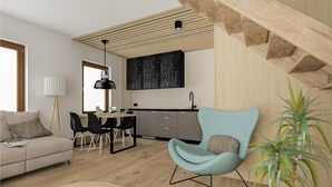 Una sala de estar moderna con un sofá, una mesa de comedor con sillas, un sillón azul claro, una lámpara de pie y una planta grande en maceta.