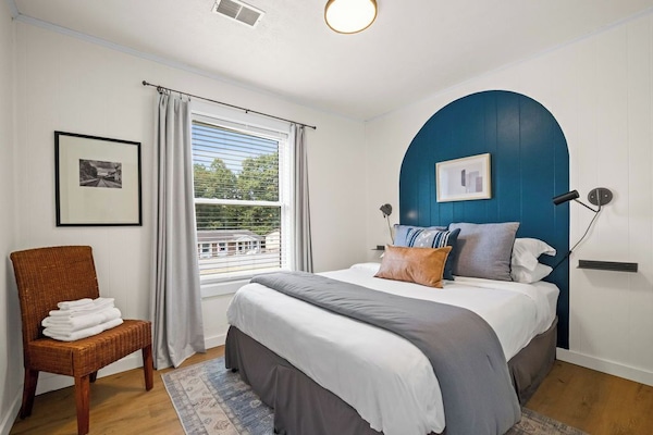 Settle into a comfortable queen bed in this quiet retreat, ideal for a restful night after your day of adventure.