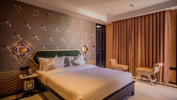 Deluxe Room, Balcony | 1 bedroom, premium bedding, pillowtop beds, minibar