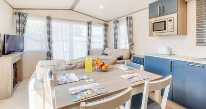 Spacious and luxurious 12ft-wide caravan with one double and one twin.