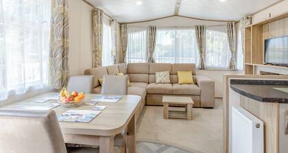 Spacious and luxurious 12ft-wide caravan with one double and one twin.