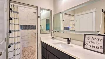 Jetted tub, hair dryer, towels, soap