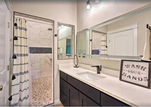 Jetted tub, hair dryer, towels, soap