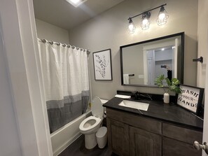 Shower, jetted tub, hair dryer, towels