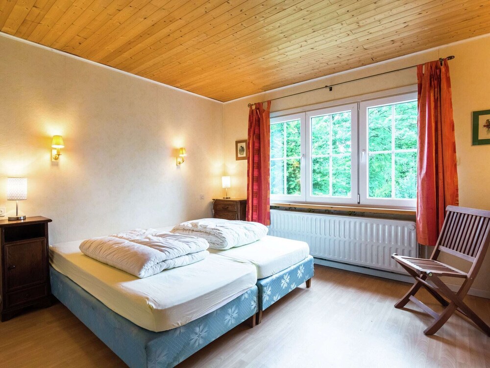 Butgenbach Shell Detached chalet with views of the lake of Butgenbach in the middle of ...