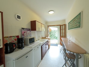 Fridge, microwave, dishwasher, coffee/tea maker
