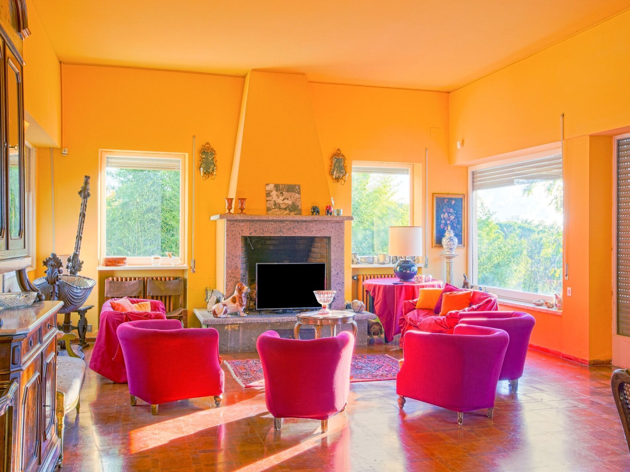 TV, fireplace, books