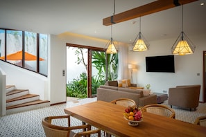 Private Pool Deluxe Villa - 3 Bedrooms | Living area | 52-inch Smart TV with digital channels, TV - WAKA VILLA Private Resort & Spa 16 + Adults Only (Siem Reap)