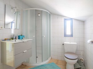 Baignoire, sèche-cheveux