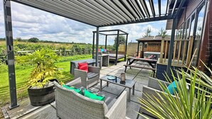 Outdoor dining - Recently upgraded with Gazebo over hot tub and side bar with stools. (Raywell, Beverley)