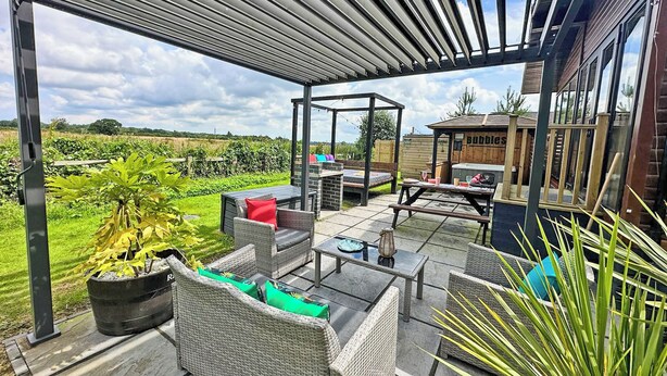 Outdoor dining - Recently upgraded with Gazebo over hot tub and side bar with stools. (Raywell, Beverley)