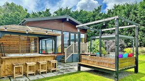 Terrace/patio - Recently upgraded with Gazebo over hot tub and side bar with stools. (Raywell, Beverley)