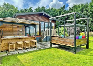 Terrace/patio - Recently upgraded with Gazebo over hot tub and side bar with stools. (Raywell, Beverley)