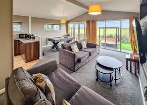 Unclassified image, 2 of 12, button - Recently upgraded with Gazebo over hot tub and side bar with stools. (Raywell, Beverley)