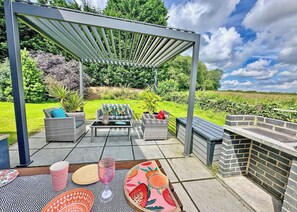 Unclassified image, 4 of 13, button - Recently upgraded with Gazebo over hot tub and side bar with stools. (Raywell, Beverley)