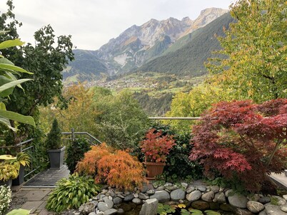 Cozy apartment on the garden in a beautiful panoramic position