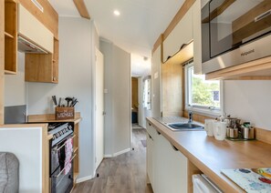 Refrigerador, horno, parrilla de estufa y tostadora 