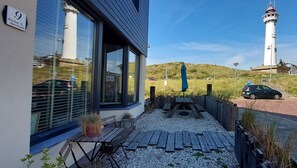 Outdoor dining - Top location! Next to lighthouse, beach 50m FLOW (Egmond aan Zee)