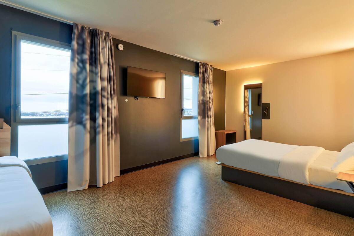 Family Quadruple Room, Non Smoking | Premium bedding, desk, laptop workspace, blackout curtains