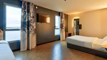 Family Quadruple Room, Non Smoking | Premium bedding, desk, laptop workspace, blackout drapes