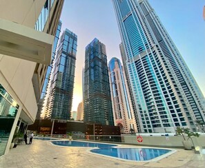 Outdoor pool - Brightline Property in Marina for Short Term Rent (Dubai)