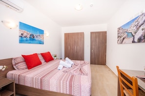 Standard Apartment, 1 Bedroom | 1 bedroom, desk, laptop workspace, blackout drapes