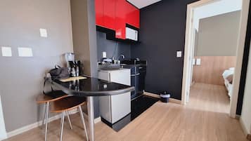 Apartamento | Cozinha privada | Frigobar