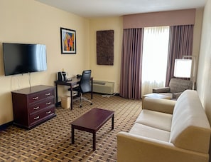 Suite, 1 King Bed with Sofa bed, Jetted Tub | Living area