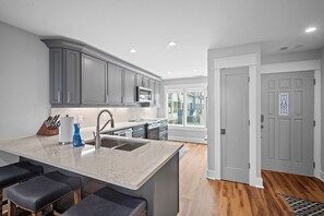 Fridge, microwave, dishwasher, coffee/tea maker