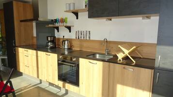 Réfrigérateur, four, plaque de cuisson, lave-vaisselle