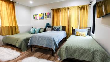 4 bedrooms, desk, iron/ironing board, travel cot