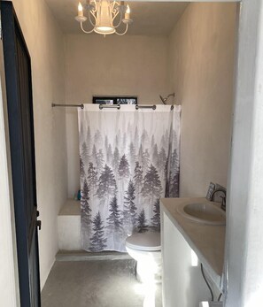 Shower, jetted bath, towels, soap