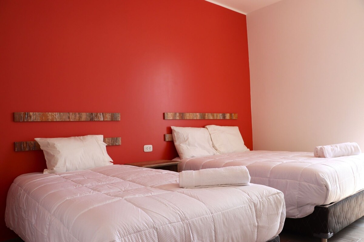 Premium bedding, down comforters, desk, laptop workspace