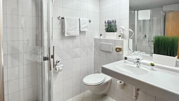 Shower, free toiletries, hair dryer, towels