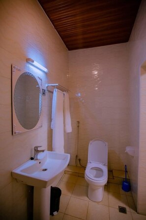 Standard Double Room, 1 King Bed, Balcony | Bathroom | Slippers - La Classe Hotel (Gihundwe)